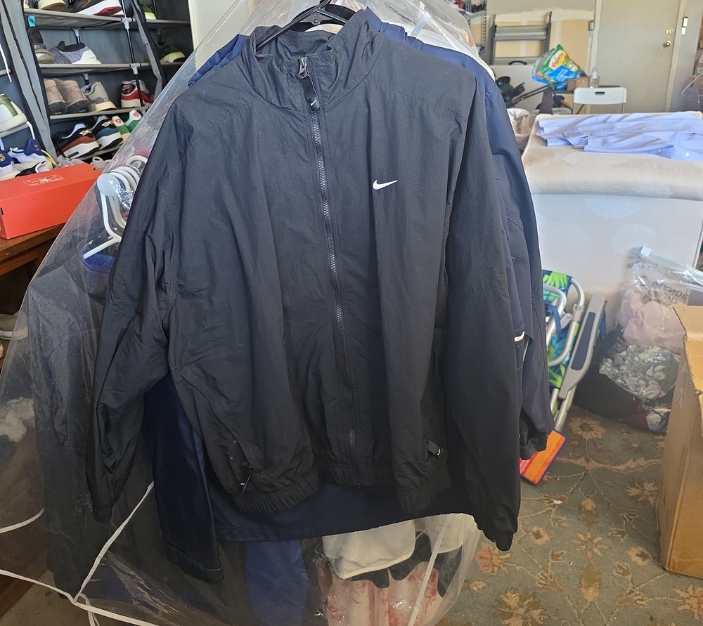 Nike Black Men's Lightweight Windbreaker Jacket with White Swoosh